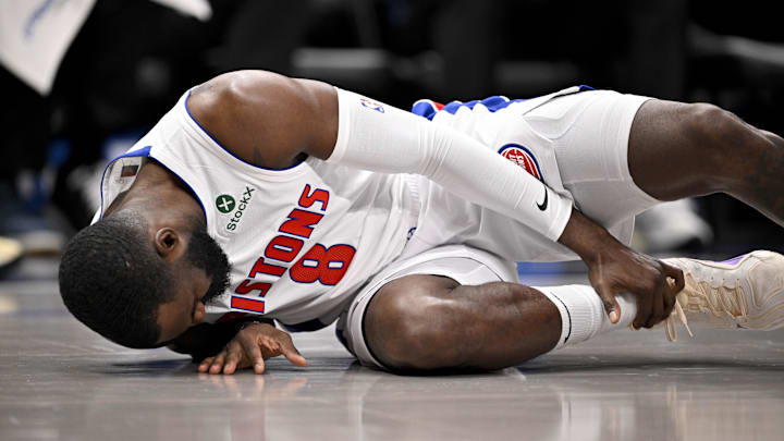 Mar 21, 2025; Dallas, Texas, USA; Detroit Pistons forward Tim Hardaway Jr. (8) grabs his leg after he falls to the floor during the first half against the Dallas Maverick at the American Airlines Center. Mandatory Credit: Jerome Miron-Imagn Images Mar 21, 2025; Dallas, Texas, USA; Detroit Pistons forward Tim Hardaway Jr. (8) grabs his leg after he falls to the floor during the first half against the Dallas Maverick at the American Airlines Center. Mandatory Credit: Jerome Miron-Imagn Images