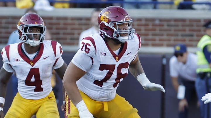 Sep 21, 2024; Ann Arbor, Michigan, USA;  USC Trojans offensive lineman Mason Murphy (76) blocks against the Michigan Wolverines at Michigan Stadium. Mandatory Credit: Rick Osentoski-Imagn Images
