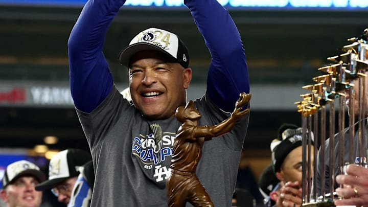 Oct 30, 2024; New York, New York, USA; Los Angeles Dodgers manager Dave Roberts (30) celebrates after winning the 2024 MLB World Series against the New York Yankees at Yankee Stadium. Mandatory Credit: Vincent Carchietta-Imagn Images Oct 30, 2024; New York, New York, USA; Los Angeles Dodgers manager Dave Roberts (30) celebrates after winning the 2024 MLB World Series against the New York Yankees at Yankee Stadium. Mandatory Credit: Vincent Carchietta-Imagn Images