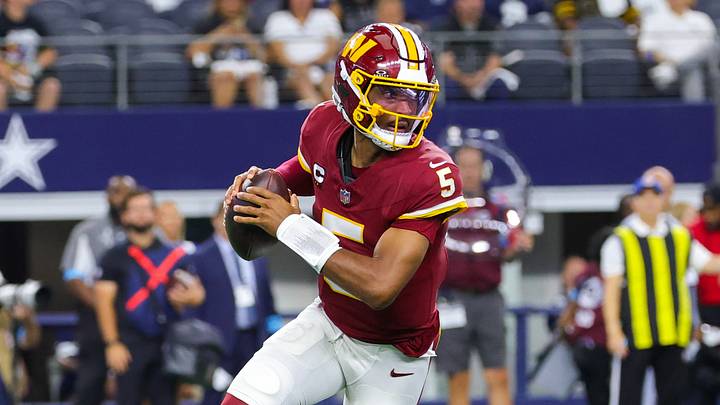 Washington Commanders quarterback Jayden Daniels (5) throws during the game against the Dallas Cowboys at AT&T Stadium. Washington Commanders quarterback Jayden Daniels (5) throws during the game against the Dallas Cowboys at AT&T Stadium.
