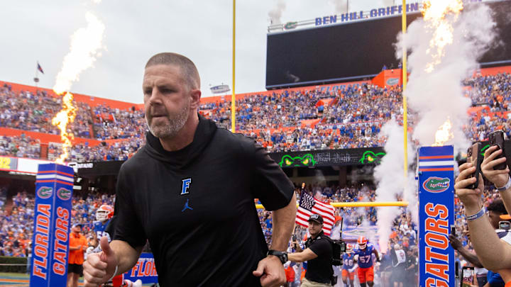 Florida Gators head coach Billy Napier runs onto the field before the start of the game at Ben Hill Griffin Stadium in Gainesville, FL on Saturday, September 7, 2024 against the Samford Bulldogs. The Gators won 45-7. [Doug Engle/Gainesville Sun]