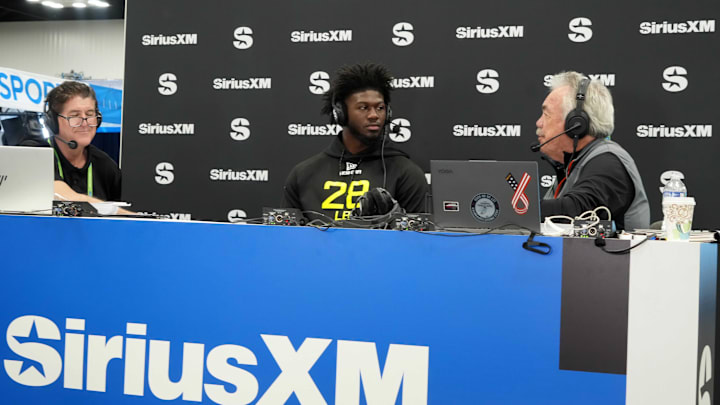 Feb 26, 2025; Indianapolis, IN, USA; Georgia linebacker Jalon Walker (LB28), center, is interviewed by SiriusXM radio hosts Jim Miller (left) and Pat Kirwan during the 2025 NFL Scouting Combine at the Indiana Convention Center. Mandatory Credit: Kirby Lee-Imagn Images
