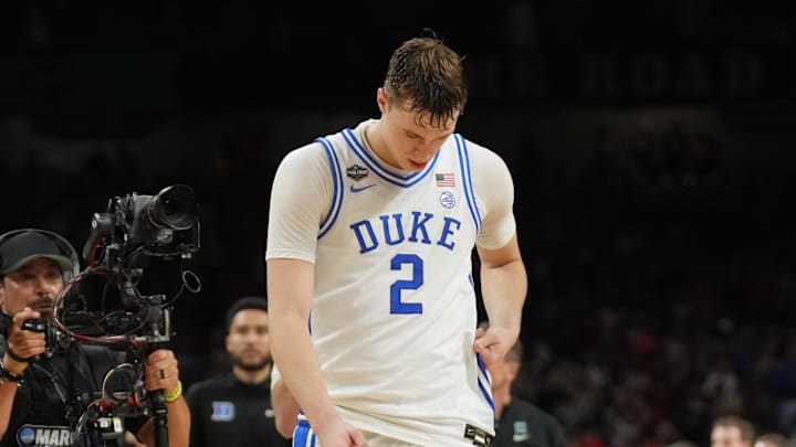 Apr 5, 2025; San Antonio, TX, USA;  Duke Blue Devils forward Cooper Flagg (2) reacts after losing to the Houston Cougars in the semifinals of the men's Final Four of the 2025 NCAA Tournament at the Alamodome. Mandatory Credit: Robert Deutsch-Imagn Images
