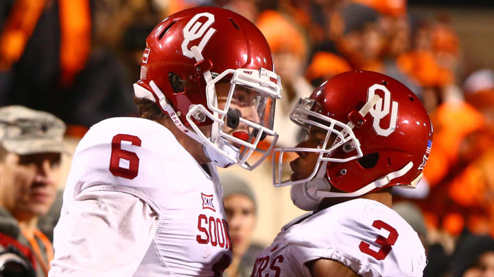 Nov 28, 2015; Stillwater, OK, USA; Oklahoma Sooners quarterback Baker Mayfield (6) celebrates with wide receiver Sterling Shepard after running for a touchdown in the second half against the Oklahoma State Cowboys at Boone Pickens Stadium. The Sooners defeated the Cowboys 58-23. Mandatory Credit: Mark J. Rebilas-USA TODAY Sports Nov 28, 2015; Stillwater, OK, USA; Oklahoma Sooners quarterback Baker Mayfield (6) celebrates with wide receiver Sterling Shepard after running for a touchdown in the second half against the Oklahoma State Cowboys at Boone Pickens Stadium. The Sooners defeated the Cowboys 58-23. Mandatory Credit: Mark J. Rebilas-USA TODAY Sports