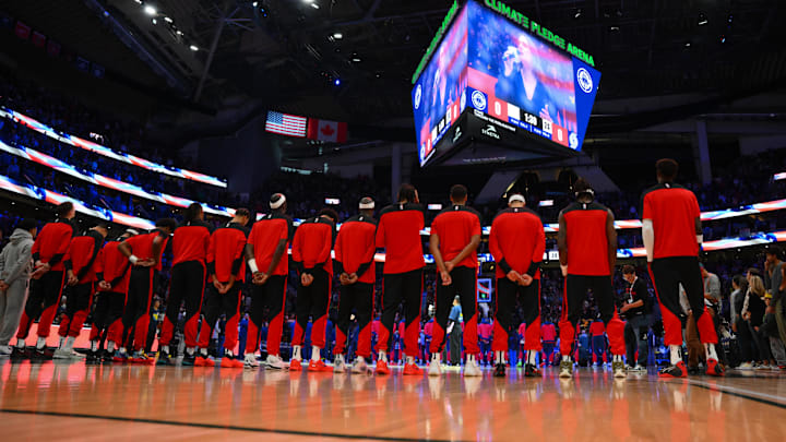 Oct 11, 2024; Seattle, Washington, USA; The Portland Trail Blazers stand for the national anthem before the game against the Los Angeles Clippers at Climate Pledge Arena. Mandatory Credit: Steven Bisig-Imagn Images Oct 11, 2024; Seattle, Washington, USA; The Portland Trail Blazers stand for the national anthem before the game against the Los Angeles Clippers at Climate Pledge Arena. Mandatory Credit: Steven Bisig-Imagn Images