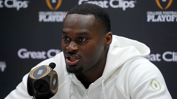 Jan 18, 2025; Atlanta, GA, USA; Notre Dame Fighting Irish running back Jeremiyah Love (4) talks to the media during 2025 CFP National Championship Media Day at Georgia World Congress Center, Building A. 