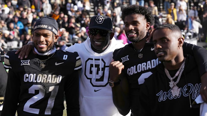Nov 29, 2024; Boulder, Colorado, USA; Colorado Buffaloes safety Shilo Sanders (21) and head coach Deion Sanders and quarterback Shedeur Sanders (2) and social media producer Deion Sanders Jr. following the win against the Oklahoma State Cowboys at Folsom Field. Nov 29, 2024; Boulder, Colorado, USA; Colorado Buffaloes safety Shilo Sanders (21) and head coach Deion Sanders and quarterback Shedeur Sanders (2) and social media producer Deion Sanders Jr. following the win against the Oklahoma State Cowboys at Folsom Field.