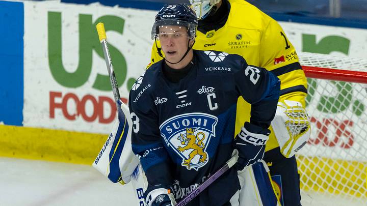 Aug 3, 2024; Plymouth, MI, USA; Finland's forward Jesse Kiiskinen (23) sets up in front of Sweden's goaltender Marcus Gidlof (1) during the second period of the 2024 World Junior Summer Showcase at USA Hockey Arena. Mandatory Credit: David Reginek-USA TODAY Sports Aug 3, 2024; Plymouth, MI, USA; Finland's forward Jesse Kiiskinen (23) sets up in front of Sweden's goaltender Marcus Gidlof (1) during the second period of the 2024 World Junior Summer Showcase at USA Hockey Arena. Mandatory Credit: David Reginek-USA TODAY Sports
