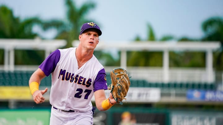 Fort Myers Mighty Mussels outfielder Walker Jenkins (27) catches a ball from the dugout during the second inning of a game against the Tampa Tarpons at Hammond Stadium in Fort Myers on Friday, June 28, 2024. Fort Myers Mighty Mussels outfielder Walker Jenkins (27) catches a ball from the dugout during the second inning of a game against the Tampa Tarpons at Hammond Stadium in Fort Myers on Friday, June 28, 2024.