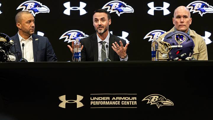 Jan 29, 2026; Owings Mills, MD, USA; Sashi Brown, Jesse Minter, and Eric DeCosta on the podium at the press conference introducing Jesse Minter at Under Armour Performance Center. Mandatory Credit: Lexi Thompson-Imagn Images