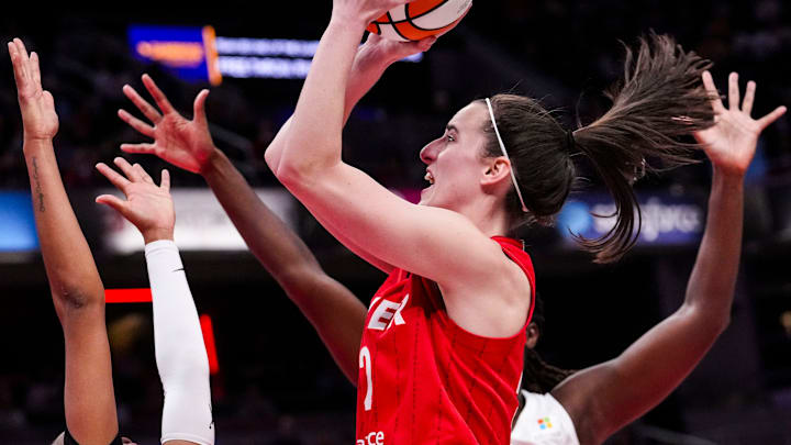 Indiana Fever guard Caitlin Clark (22) goes up for a shot Indiana Fever guard Caitlin Clark (22) goes up for a shot