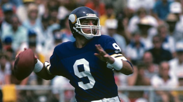 Aug 1982; Canton, OH, USA; FILE PHOTO; Minnesota Vikings quarterback Tommy Kramer (9) in action during the Hall of Fame game at Fawcett Stadium. Mandatory Credit: Malcolm Emmons-USA TODAY Sports