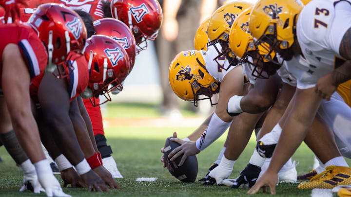 Nov 30, 2024; Tucson, Arizona, USA; General view down the line of scrimmage as the Arizona State Sun Devils prepare to snap the ball against the Arizona Wildcats in the first half during the Territorial Cup at Arizona Stadium. Mandatory Credit: Mark J. Rebilas-Imagn Images