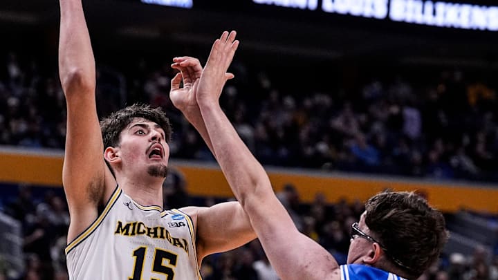 Michigan center Aday Mara (15) makes a jump shot against Saint Louis center Robbie Avila (21) during the second half of NCAA Tournament Second Round at KeyBank Center in Buffalo on Saturday, March 21, 2026.