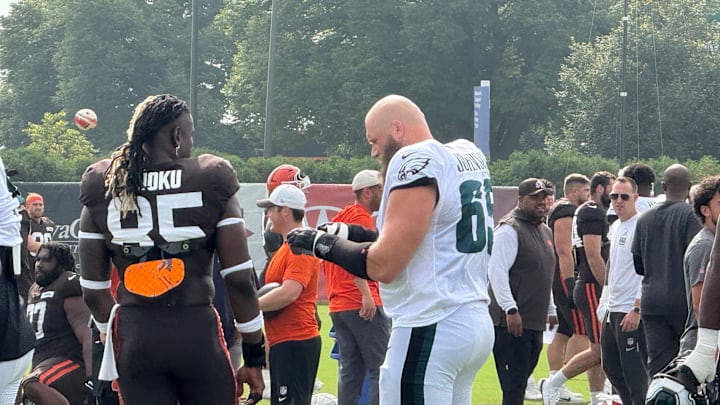 Eagles right tackle Lane Johnson (right) and Browns tight end David Njoku visit before the teams held their first of two practices against each other on Aug. 13, 2025. Eagles right tackle Lane Johnson (right) and Browns tight end David Njoku visit before the teams held their first of two practices against each other on Aug. 13, 2025.