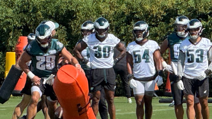 Eagles linebackers Jihaad Campbell (3) and Jeremiah Trotter, Jr., are vying to start the opener opposite Zach Baun (53)