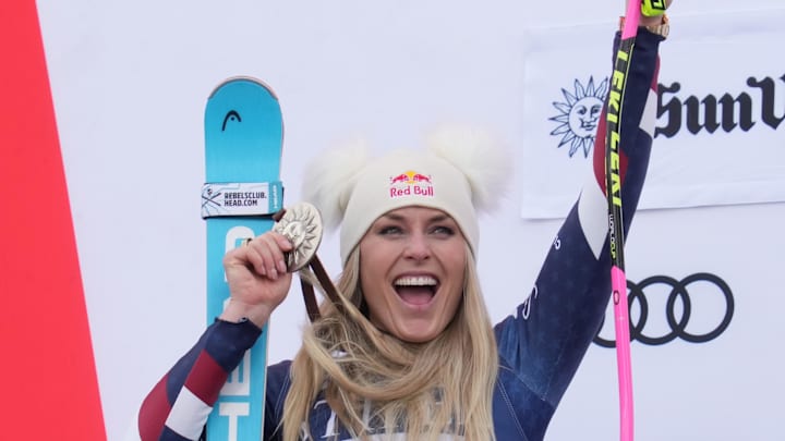 Mar 23, 2025; Sun Valley, ID, USA; Lindsey Vonn of the United States celebrates on the podium after placing second in the Super G alpine skiing race in the 2025 FIS Ski World Cup at Sun Valley. 