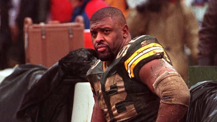 Green Bay Packers defensive end Reggie White rests during their 1997 playoff game at Lambeau Field. Green Bay Packers defensive end Reggie White rests during their 1997 playoff game at Lambeau Field.