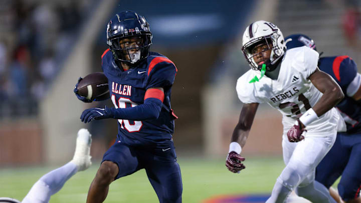 Allen's Nate Wegner runs the ball against Midland Lee in Week 1. 
