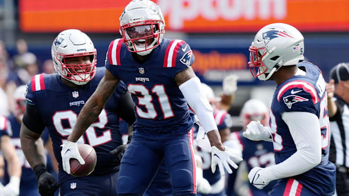 Patriots defensive back #31 Jonathan Jones celebrates a 2nd quarter interception.

04 Patriots