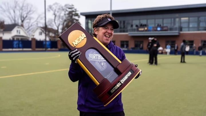 Northwestern field hockey head coach Tracey Fuchs holds the National Championship trophy on November 24, 2024.