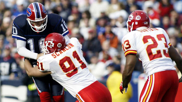 Nov 13, 2005; Orchard Park, NY, USA; FILE PHOTO; Kansas City Chiefs linebacker Rich Scanlon (91) sacks Buffalo Bills quarterback Kelly Holcomb (10) at Ralph Wilson Stadium. The Bills defeated the Chiefs 14-3. Mandatory Credit: MPS-Imagn Images