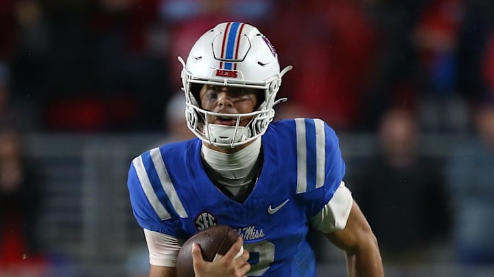Nov 9, 2024; Oxford, Mississippi, USA; Mississippi Rebels quarterback Jaxson Dart (2) runs the ball during the second half against the Georgia Bulldogs at Vaught-Hemingway Stadium. Mandatory Credit: Petre Thomas-Imagn Images