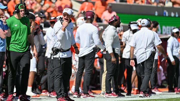 Oct 4, 2025; Blacksburg, Va.; Virginia Tech head coach Phillip Montgomery instructs his team against Wake Forest.