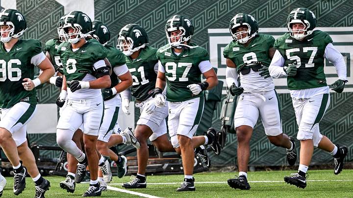 Michigan State defensive linemen run during football practice on Monday, Aug. 17, 2026, in East Lansing. Michigan State defensive linemen run during football practice on Monday, Aug. 17, 2026, in East Lansing.