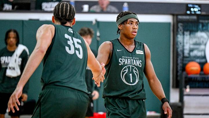 Michigan State’s Jeremy Fears Jr., right, slaps hands with Jesse McCulloch during the first basketball practice of the season on Tuesday, Sept. 22, 2026, at the Breslin Center in East Lansing.