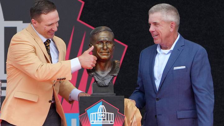 Drew Brees looks at his bust with former Saints coach Sean Payton at the 2026 Pro Football Hall of Fame Enshrinement. Drew Brees looks at his bust with former Saints coach Sean Payton at the 2026 Pro Football Hall of Fame Enshrinement.