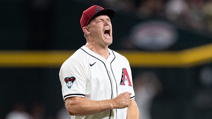 Arizona Diamondbacks pitcher Paul Sewald (38) celebrates after closing the game to win 4-3 against the Pittsburgh Pirates on July 26, 2024, at Chase Field in Phoenix.