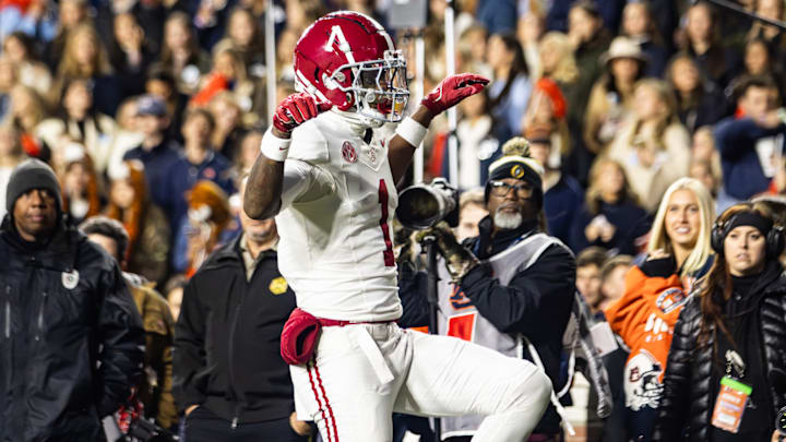 Alabama wide receiver Isaiah Horton hits the Crimson Crane after a touchdown in the first half of the Iron Bowl on November 29, 2025.