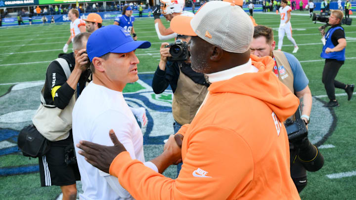 Oct 5, 2025; Seattle, Washington, USA; Seattle Seahawks head coach Mike MacDonald and Tampa Bay Buccaneers head coach Todd Bowles shake hands following the game at Lumen Field.