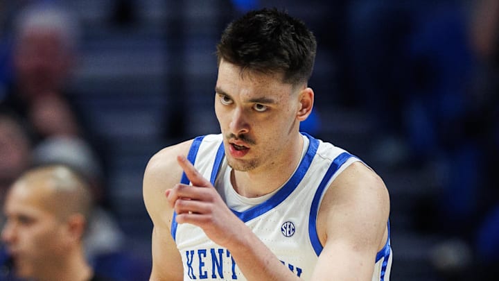 Feb 4, 2026; Lexington, Kentucky, USA; Kentucky Wildcats forward Andrija Jelavic (4) celebrates a basket during the first half against the Oklahoma Sooners at Rupp Arena at Central Bank Center. Mandatory Credit: Jordan Prather-Imagn Images