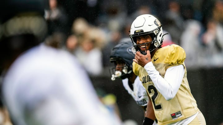 Colorado's Shedeur Sanders smiles before taking a snap during a Colorado football spring game at Folsom Field in Boulder, Colo., on Saturday, April 27, 2024. Colorado's Shedeur Sanders smiles before taking a snap during a Colorado football spring game at Folsom Field in Boulder, Colo., on Saturday, April 27, 2024.