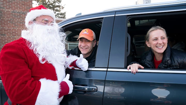 Santa pays a visit to Steve and Meredith Carrel and their family before they go out to deliver gifts for the nonprofit Jimmy’s Kids