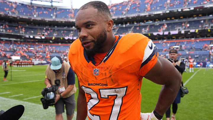 Sep 7, 2025; Denver, Colorado, USA; Denver Broncos running back J.K. Dobbins (27) after the game at Empower Field at Mile High. 
