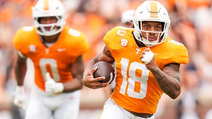 Tennessee running back DeSean Bishop (18) runs with the ball during Tennessee's home opener against ETSU at Neyland Stadium in Knoxville, Tenn., on Sept. 6, 2025. Tennessee running back DeSean Bishop (18) runs with the ball during Tennessee's home opener against ETSU at Neyland Stadium in Knoxville, Tenn., on Sept. 6, 2025.