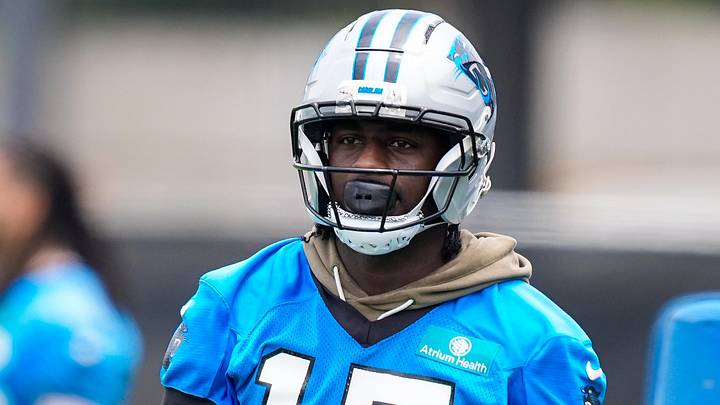 Carolina Panthers wide receiver Xavier Legette (17) walks back to the line 