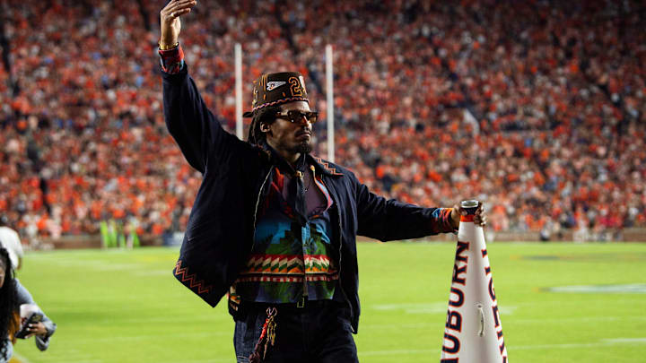 Former Auburn quarterback Cam Newton saw his No. 2 jersey retired by the Tigers.