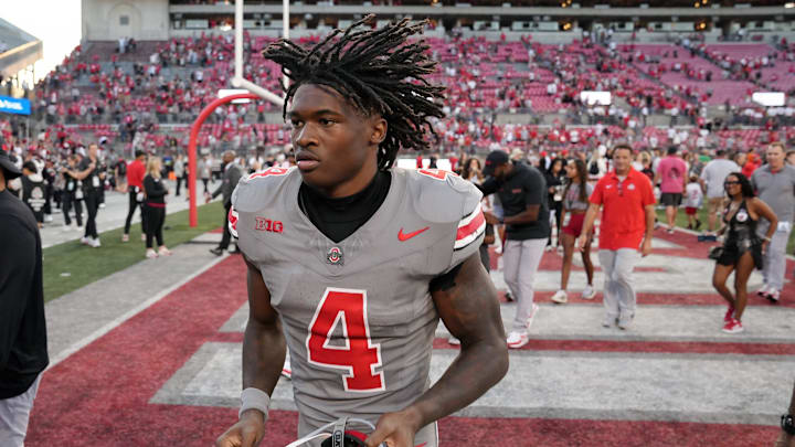 Oct 5, 2024; Columbus, OH, USA; Ohio State Buckeyes wide receiver Jeremiah Smith (4) runs off the field after beating Iowa Hawkeyes after the NCAA football game at Ohio Stadium. Oct 5, 2024; Columbus, OH, USA; Ohio State Buckeyes wide receiver Jeremiah Smith (4) runs off the field after beating Iowa Hawkeyes after the NCAA football game at Ohio Stadium.