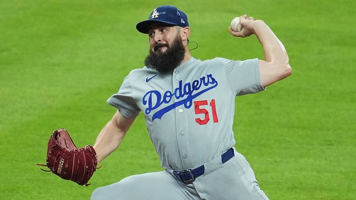 Oct 7, 2026; Cumberland, Georgia, USA;  Los Angeles Dodgers pitcher Alex Vesia (51) pitches against the Atlanta Braves during the fifth inning in game four of the NLDS for the 2026 MLB Playoffs at Truist Park.  Mandatory Credit: Dale Zanine-Imagn Images