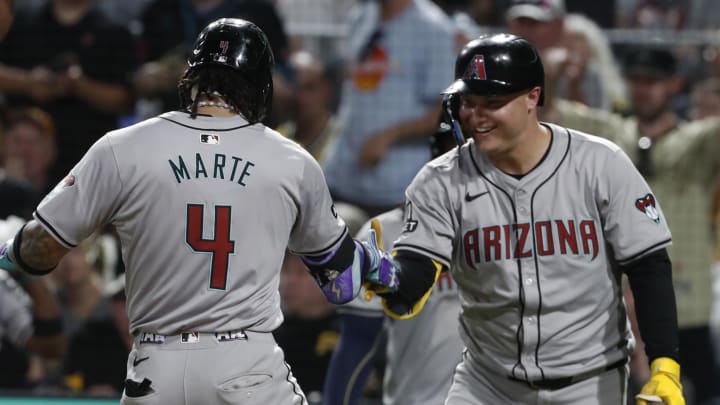 Aug 2, 2024; Pittsburgh, Pennsylvania, USA; Arizona Diamondbacks designated hitter Joc Pederson (3) reacts to second baseman Ketel Marte (4) crossing home plate with his second solo home run of the game against the Pittsburgh Pirates during the ninth inning at PNC Park. Arizona won 9-8. Mandatory Credit: Charles LeClaire-USA TODAY Sports Aug 2, 2024; Pittsburgh, Pennsylvania, USA; Arizona Diamondbacks designated hitter Joc Pederson (3) reacts to second baseman Ketel Marte (4) crossing home plate with his second solo home run of the game against the Pittsburgh Pirates during the ninth inning at PNC Park. Arizona won 9-8. Mandatory Credit: Charles LeClaire-USA TODAY Sports