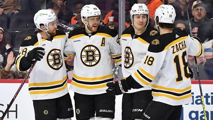 Apr 9, 2023; Philadelphia, Pennsylvania, USA; Boston Bruins defenseman Matt Grzelcyk (48), right wing David Pastrnak (88), left wing Tyler Bertuzzi (59) and center Pavel Zacha (18) celebrate goal against the Philadelphia Flyers during the first period at Wells Fargo Center. Mandatory Credit: Eric Hartline-USA TODAY Sports