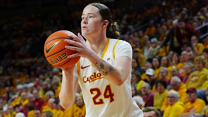 Iowa State Cyclones' forward Addy Brown (24) takes a three-point shot against Oklahoma State Cowgirls during the first quarter in the senior day women basketball at Hilton Coliseum on February. 25, 2026, in Ames, Iowa.