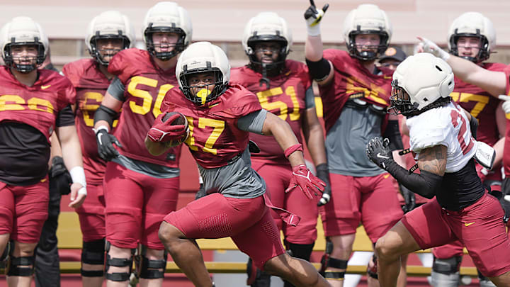 Iowa State running back Jayden Jackson (47) runs with the ball around defensive back Xavier Martinez (22) during Spring football at Jack Trice Stadium on April 25, 2026, in Ames, Iowa