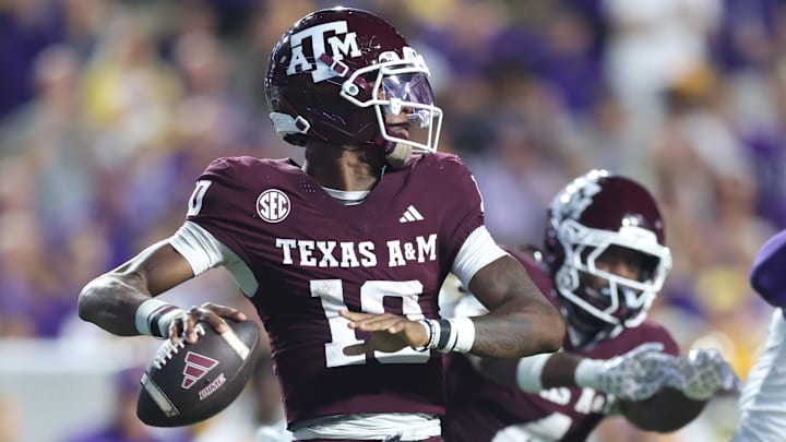 Oct 25, 2025; Baton Rouge, Louisiana, USA; Texas A&M Aggies quarterback Marcel Reed (10) drops to throw during the first half against the Louisiana State Tigers at Tiger Stadium. Mandatory Credit: Stephen Lew-Imagn Images