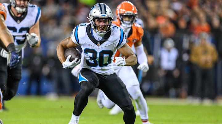 Nov 9, 2023; Chicago, Illinois, USA; Carolina Panthers running back Chuba Hubbard (30) runs the ball against the Chicago Bears during the first quarter at Soldier Field. Nov 9, 2023; Chicago, Illinois, USA; Carolina Panthers running back Chuba Hubbard (30) runs the ball against the Chicago Bears during the first quarter at Soldier Field.