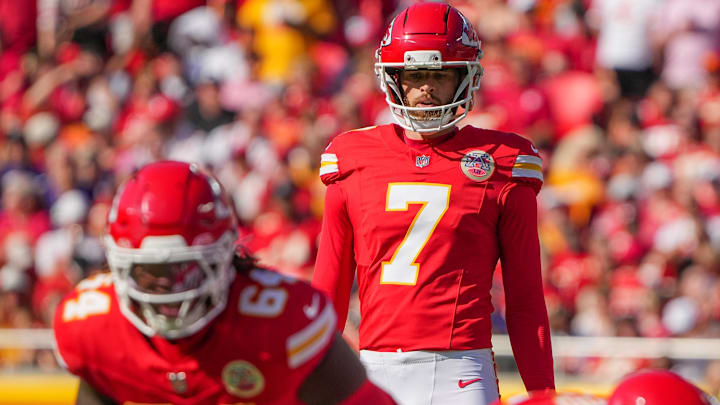 Sep 28, 2025; Kansas City, Missouri, USA; Kansas City Chiefs kicker Harrison Butker (7) readies for a field goal attempt against the Baltimore Ravens during the game at GEHA Field at Arrowhead Stadium.